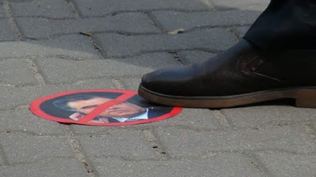 ⁣Оё зери по кардани акси Э.Раҳмонов ҷиноят аст? / آیا زیر پا کردن عکس رحمانوف جنایت است ؟